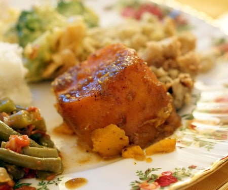 This recipe for slightly sweet, spiced and orange-flavored Candied Yams are a wonderful alternative to traditional Sweet Potato Casserole on your holiday table. |www.curiouscuisiniere.com