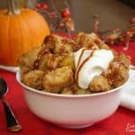 Just as good as warm pumpkin pie, this crock pot pumpkin bread pudding recipe is healthy enough for a fall breakfast, but it's enough of a treat, that it makes a wonderful dessert too! | www.CuriousCuisiniere.com