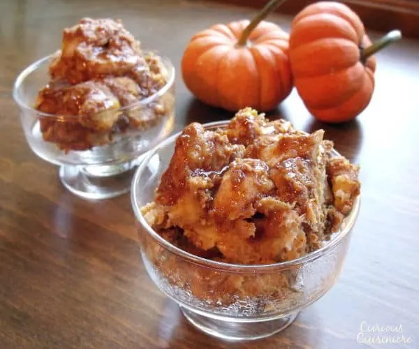 Just as good as warm pumpkin pie, this crock pot pumpkin bread pudding recipe is healthy enough for a fall breakfast, but it's enough of a treat, that it makes a wonderful dessert too! | www.curiouscuisiniere.com