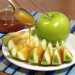 A simple, homemade caramel sauce recipe without corn syrup that adds hints of vanilla to make a great topping for fruit, ice cream, and other desserts. | www.CuriousCuisiniere.com