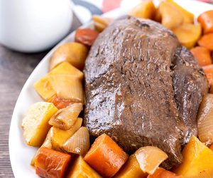 Beer braised venison roast with carrots and potatoes