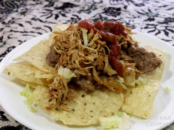 Smoky and slightly spicy, this Crock Pot Southwest Pulled Chicken is as flavorful as it is versatile and easy to make. via Curious Cuisiniere