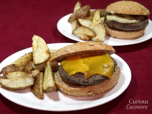 Chipotle Black Bean Burgers with Baked Garlic Home Fries via Curious Cuisiniere