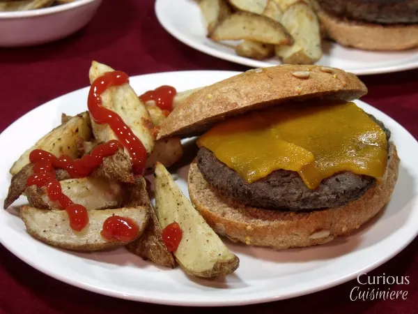Chipotle Black Bean Burgers with Baked Garlic Home Fries via Curious Cuisiniere