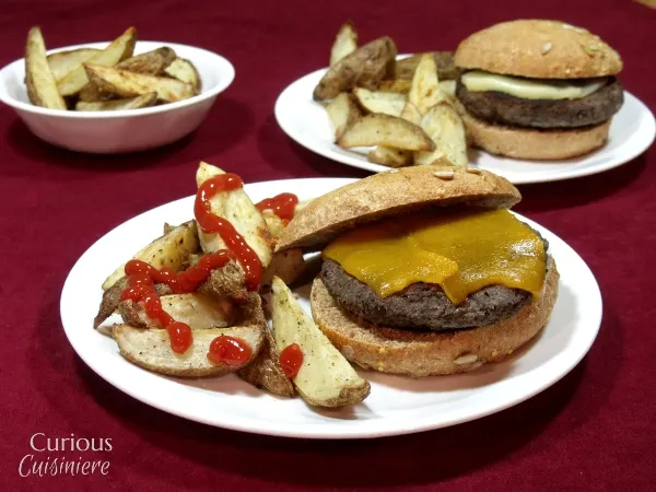 Chipotle Black Bean Burgers with Baked Garlic Home Fries via Curious Cuisiniere