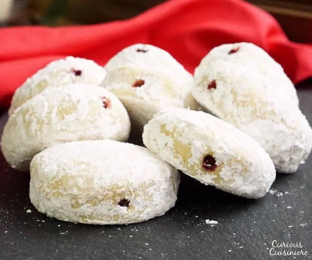 Our Authentic Polish Paczki Recipe gives you light and airy Polish Donuts that are easy to make and healthier because they're baked, not fried! | www.CuriousCuisiniere.com