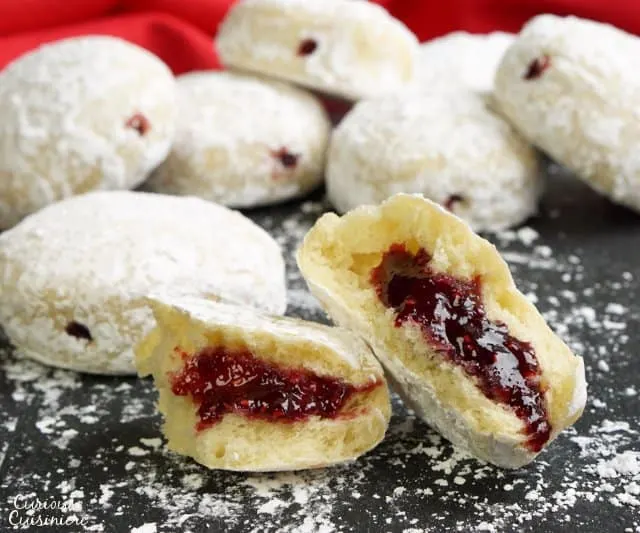 Our Authentic Polish Paczki Recipe gives you light and airy Polish Donuts that are easy to make and healthier because they're baked, not fried! | www.CuriousCuisiniere.com