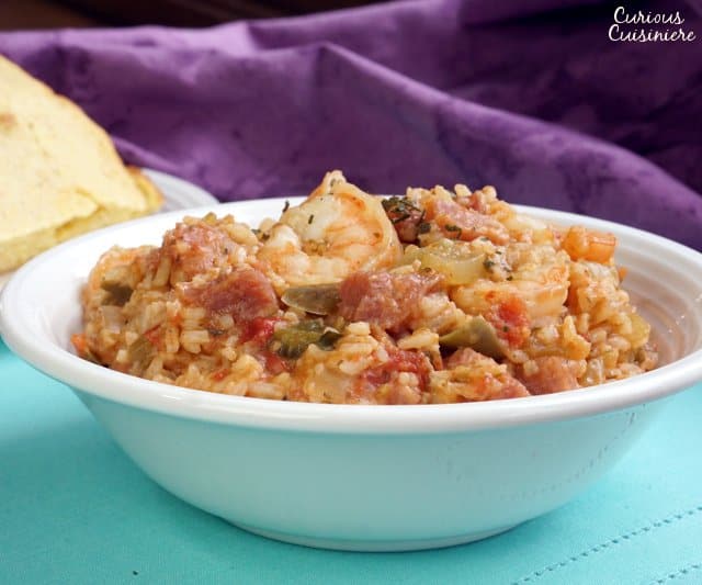 Shrimp and Ham Creole Jambalaya is a hearty and flavorful dish that is perfect for Mardi Gras or any time you want a taste of New Orleans! | www.CuriousCuisiniere.com