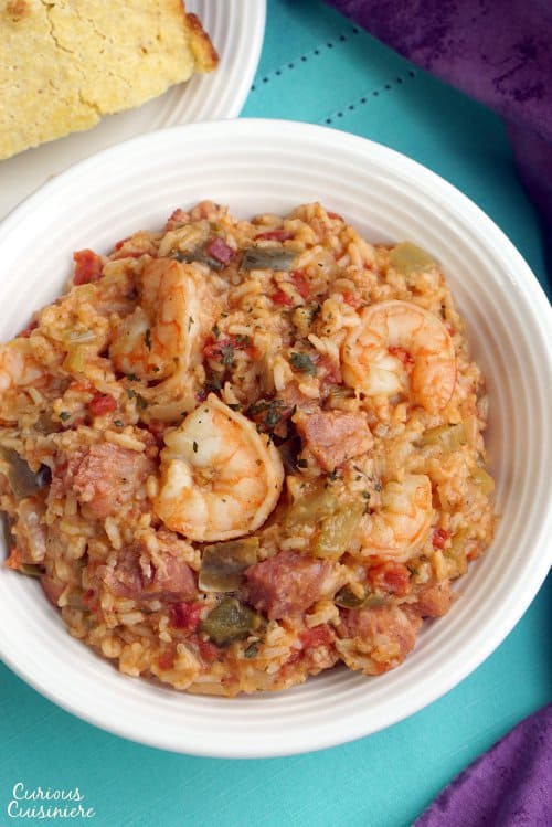 Shrimp and Ham Creole Jambalaya is a hearty and flavorful dish that is perfect for Mardi Gras or any time you want a taste of New Orleans! | www.CuriousCuisiniere.com