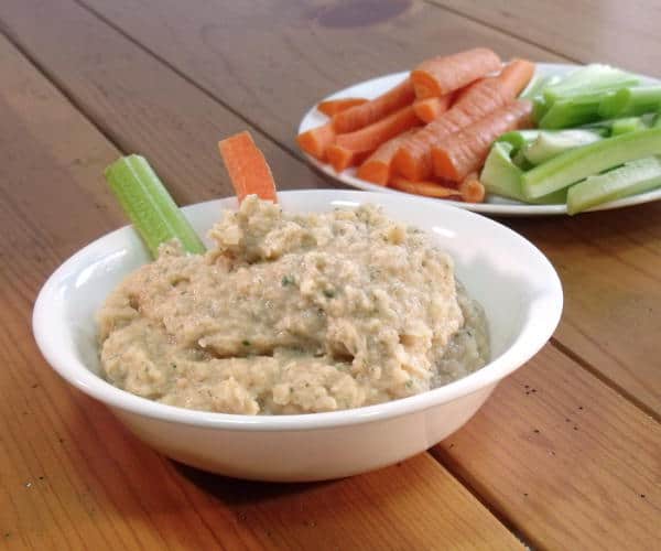 If you love hummus, you'll love the smoky twist of this White Bean Dip. It is the perfect, healthy appetizer recipe. | www.CuriousCuisiniere.com