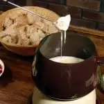 Cheese, garlic, white wine, and bread. What more do you need to enjoy a cool winter night than a big pot of Swiss fondue?