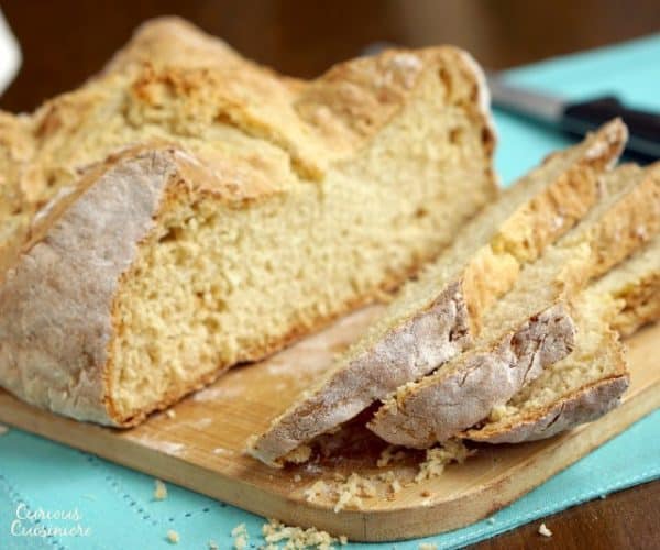 Traditional Irish soda bread recipe no raisins, sliced on a cutting board