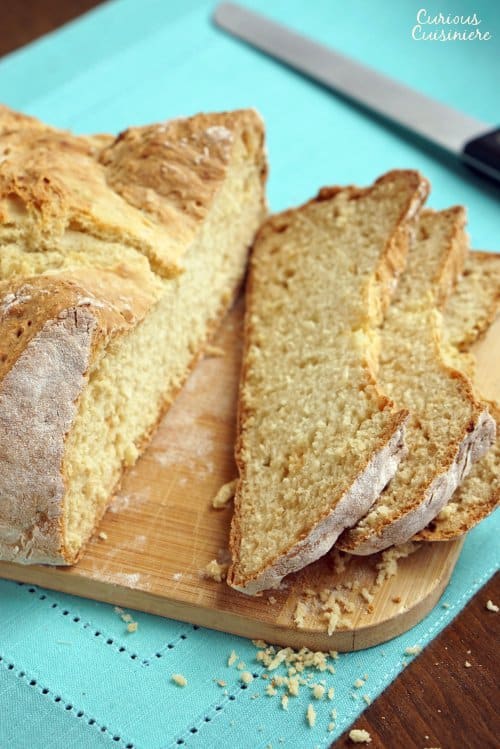 Traditional Irish soda bread no raisins, sliced on a cutting board