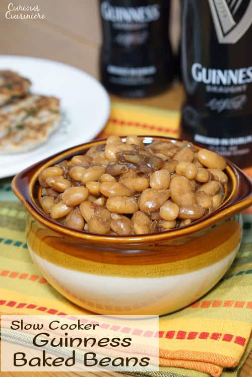 Not your classic sweet and sticky BBQ Baked Beans, these Guinness Baked Beans boast a mild and malty sweetness with a deep and robust flavor. | www.CuriousCuisiniere.com