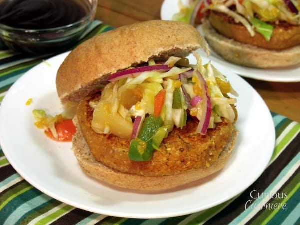 The barbecue sauce you choose will take these BBQ Chickpea Burgers in fun and new directions, giving you a veggie burger so flavorful that you won't miss the meat! | www.CuriousCuisiniere.com