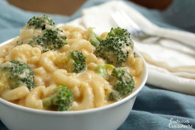 Our American classic Stovetop Mac and Cheese recipe is just as quick as the box mix, but made with real cheese! | www.CuriousCuisiniere.com