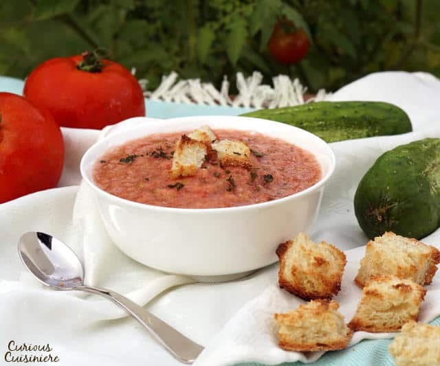 There is more than meets the eye to this chilled, Spanish soup. Gazpacho is a refreshing and flavorful chance to serve up summer in a bowl! | www.CuriousCuisiniere.com