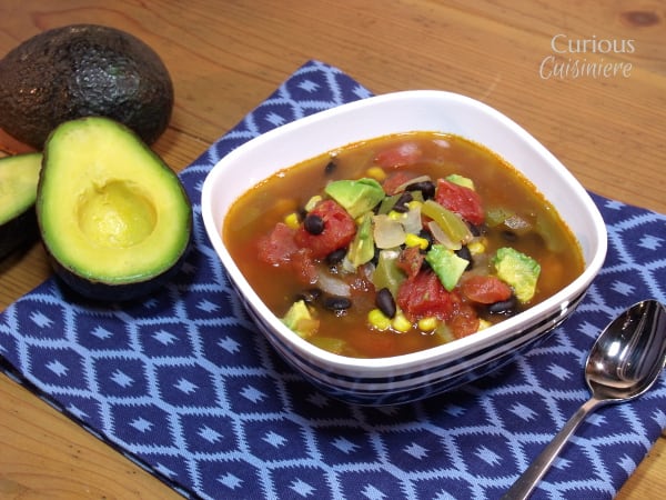 Mexican Minestrone with Avocados from Curious Cuisiniere - This Mexican Vegetable Soup uses healthy avocados for added nutrition and a creamy texture. We're calling it Mexican Minestrone for a fun fusion!