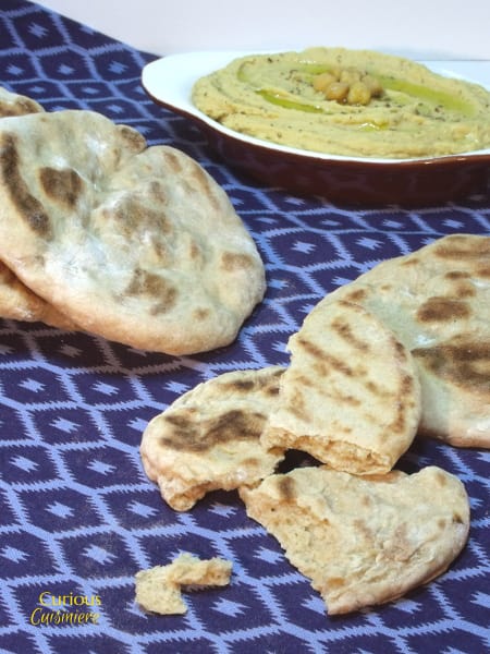 This chewy Roasted Garlic Flatbread is delicious with hummus or a warm curry. | Curious Cuisiniere