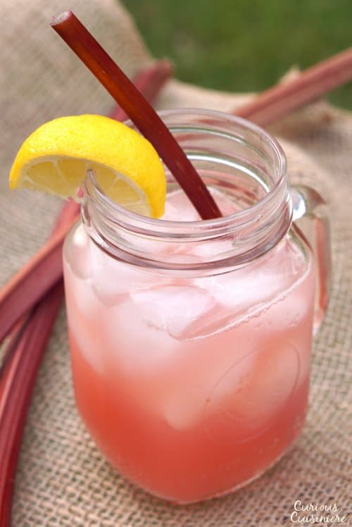 This Rhubarb Lemonade brings a unique sweet and tart twist to the refreshing summer classic drink. | www.CuriousCuisiniere.com