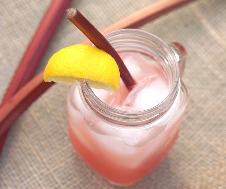 This Rhubarb Lemonade brings a unique sweet and tart twist to the refreshing summer classic drink. | www.CuriousCuisiniere.com