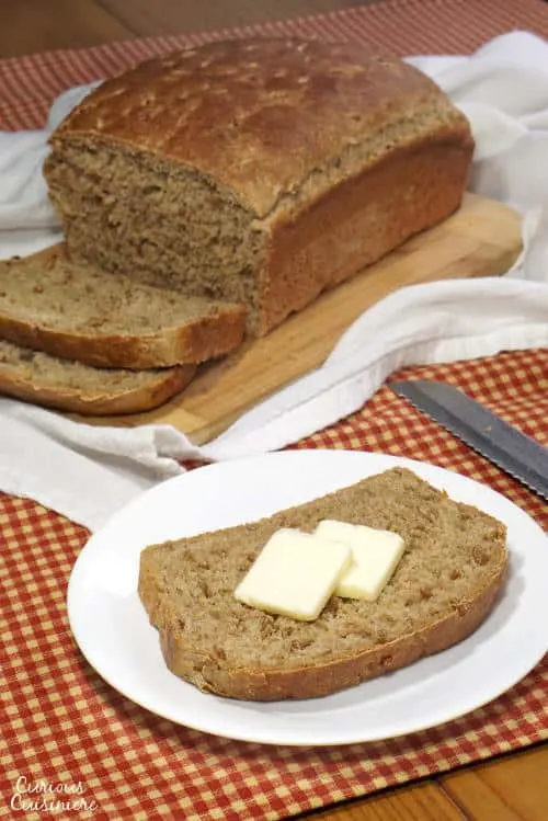 This Wheat Berry Bread is a soft, yet hearty bread that reminds us of Germany with its deep, malty sweetness and nutty, soaked wheat berries. | www.CuriousCuisiniere.com