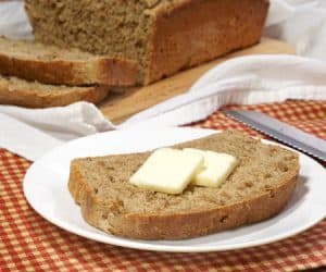 This Wheat Berry Bread is a soft, yet hearty bread that reminds us of Germany with its deep, malty sweetness and nutty, soaked wheat berries. | www.CuriousCuisiniere.com
