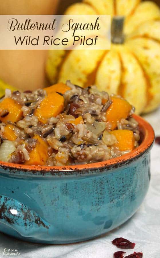 This hearty Butternut Squash Wild Rice Pilaf with Cranberries makes a delicious fall side dish or Thanksgiving stuffing! | www.CuriousCuisiniere.com