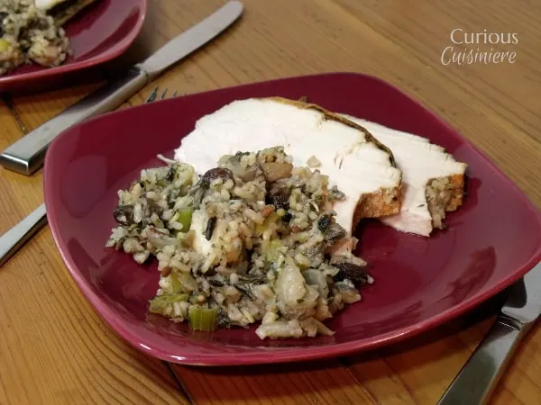 Sweet apples and raisins combine with savory herbs for an unlikely, but very tasty, combo in this mushroom wild rice stuffing. - Apple and Wild Rice Stuffing from Curious Cuisiniere