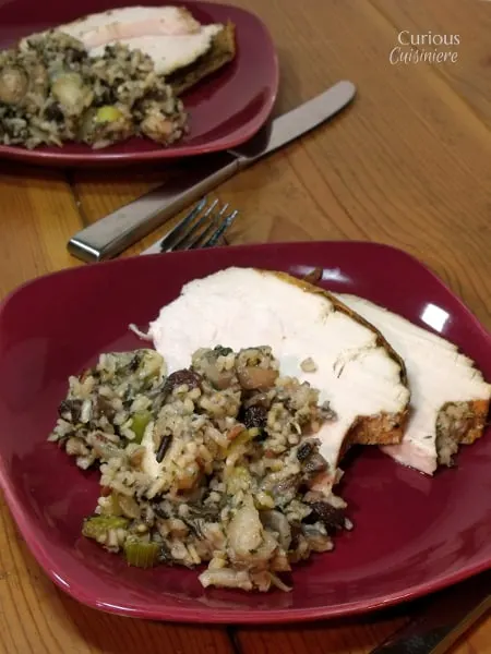 Sweet apples and raisins combine with savory herbs for an unlikely, but very tasty, combo in this mushroom wild rice stuffing. - Apple and Wild Rice Stuffing from Curious Cuisiniere