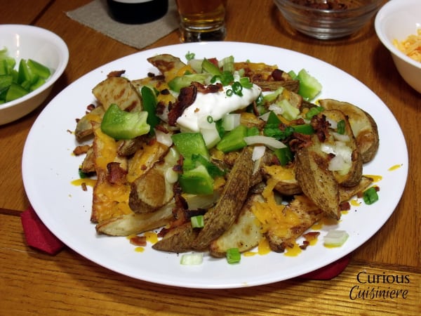 Loaded Baked Potato Nacho Bar from Curious Cuisiniere