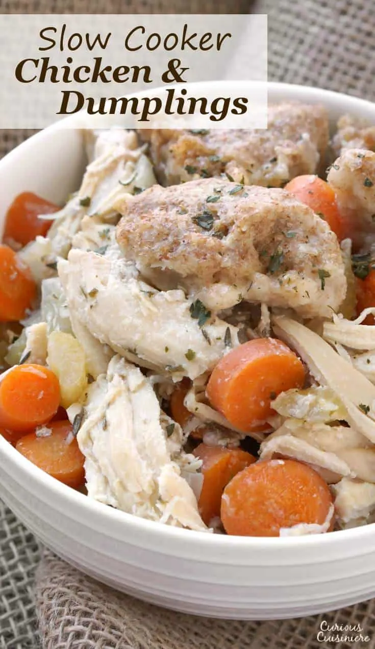 This Slow Cooker Chicken and Dumplings recipe is a hearty and slightly creamy stew made completely from scratch without canned cream of chicken soup!  | www.CuriousCuisiniere.com