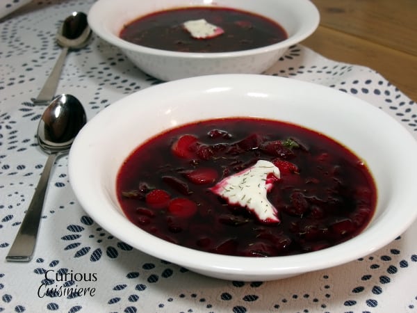 Our Polish Borscht recipe (Barszcz) is chock full of veggies and boasts a bright, sweet and sour flavor that makes it a perfect first course or warming meal. | Curious Cuisiniere