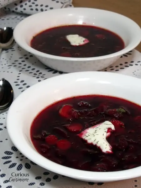 Our Polish Borscht recipe (Barszcz) is chock full of veggies and boasts a bright, sweet and sour flavor that makes it a perfect first course or warming meal. | Curious Cuisiniere