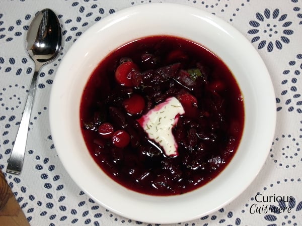 Our Polish Borscht recipe (Barszcz) is chock full of veggies and boasts a bright, sweet and sour flavor that makes it a perfect first course or warming meal. | Curious Cuisiniere