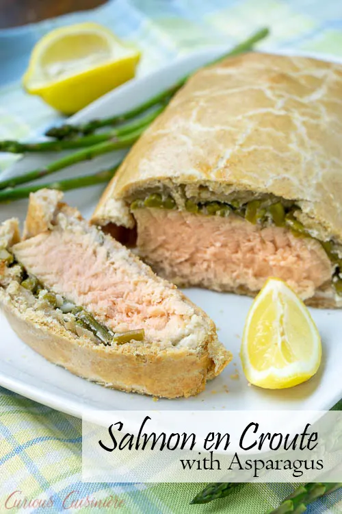 Our Salmon en Croute recipe brings salmon together with flaky pastry and asparagus. Lemon and rosemary give an extra burst of spring flavor to this dish! | www.CuriousCuisiniere.com