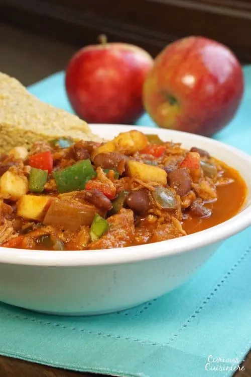 This Pulled Pork Chili uses fresh ingredients to give it a sweet and spicy flavor. You'd never guess it was an apple chili!&nbsp; | www.CuriousCuisiniere.com