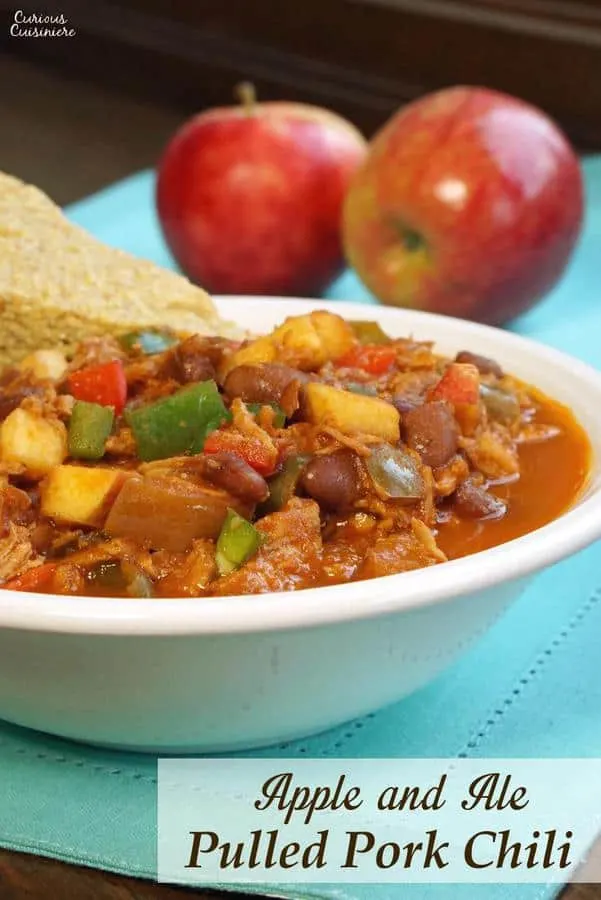 This Pulled Pork Chili uses fresh ingredients to give it a sweet and spicy flavor. You'd never guess it was an apple chili! | www.CuriousCuisiniere.com