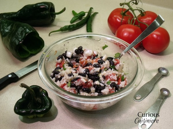 Beans, rice, and creamy cheese are the perfect filling for these Vegetarian Stuffed Poblano Peppers. | Curious Cuisiniere