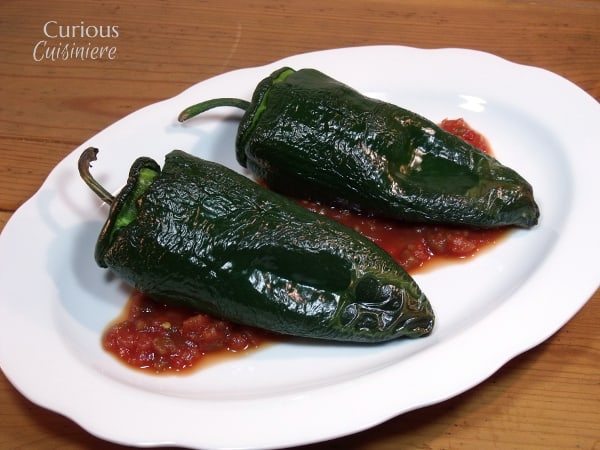 Beans, rice, and creamy cheese are the perfect filling for these Vegetarian Stuffed Poblano Peppers. | Curious Cuisiniere