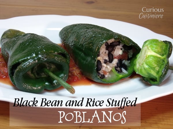 Beans, rice, and creamy cheese are the perfect filling for these Vegetarian Stuffed Poblano Peppers. | Curious Cuisiniere