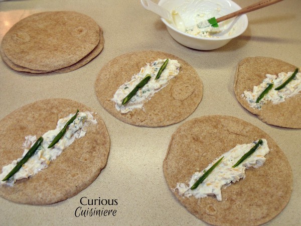 Jalapeno Popper Taquitos from Curious Cuisiniere Cream cheese and jalapeno give these Jalapeno Popper Taquitos the creamy and spice combo you love, all rolled into crispy homemade taquitos. | Curious Cuisiniere