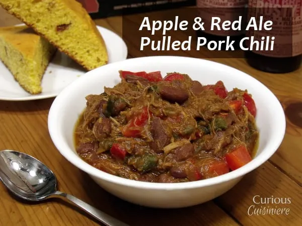 This Pulled Pork Chili uses fresh ingredients to give it a sweet and spicy flavor. You'd never guess it was an apple chili! | Curious Cuisiniere