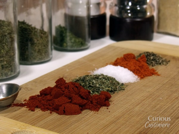 Make your own Creole and Cajun Spice Mix from spices and herbs you already have in your pantry! It's perfect for adding New Orleans seasoning to any dish! | www.CuriousCuisiniere.com