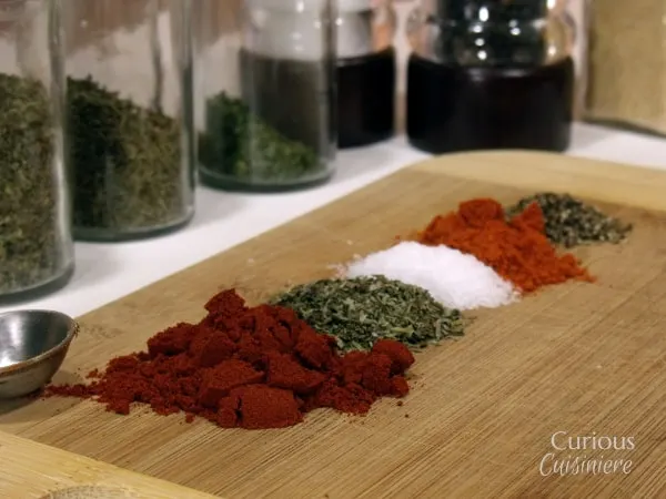 Make your own Creole and Cajun Spice Mix from spices and herbs you already have in your pantry! It's perfect for adding New Orleans seasoning to any dish! | www.CuriousCuisiniere.com