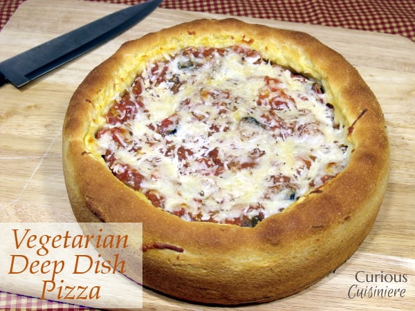Our Vegetarian Deep Dish Pizza brings the veggies and cheese to a soft-crusted, Chicago-style deep dish pizza. Meat lovers can't deny this is an epic pizza! | Curious Cuisiniere