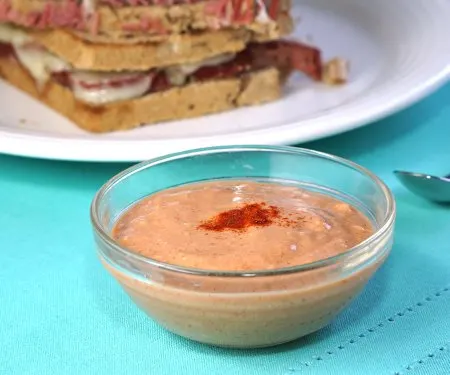 Our homemade Russian Dressing is tangy, slightly spicy, and seriously addicting! It's the perfect sauce for a Reuben Sandwich and more!| CuriousCuisiniere