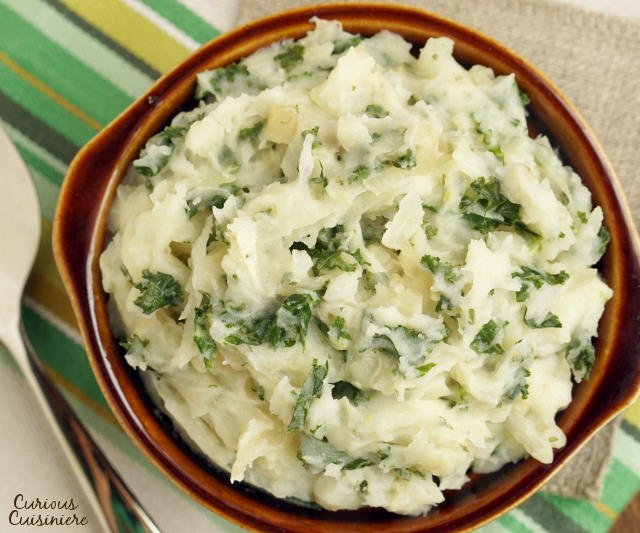 Irish Colcannon brings mashed potatoes to a whole new level with flavorful onions and nutritious cabbage. These Irish mashed potatoes are the perfect way to sneak extra veggies into your meal! | www.CuriousCuisiniere.com