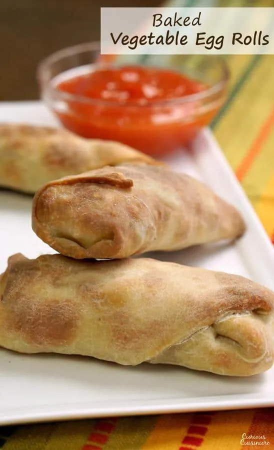 Baked Vegetable Egg Rolls are a healthier alternative to that family-favorite take-out treat. Great to freeze for later so you always have some on hand! | www.CuriousCuisiniere.com
