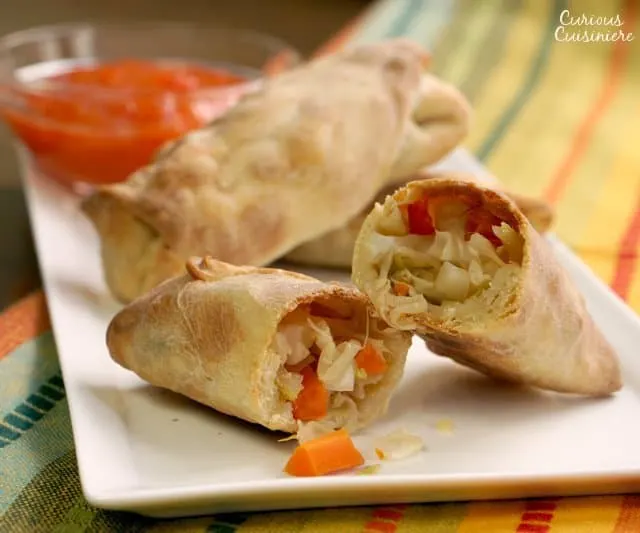 Baked Vegetable Egg Rolls are a healthier alternative to that family-favorite take-out treat. Great to freeze for later so you always have some on hand! | www.CuriousCuisiniere.com